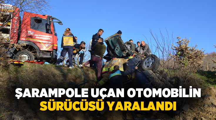  Manisa'nın Demirci ilçesinde kontrolden çıkan otomobilin şarampole devrildiği kazada sürücü