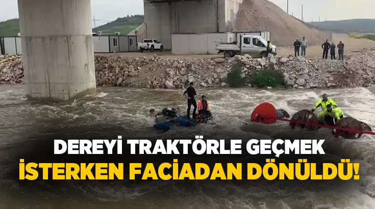 Bursa’da dereyi traktörle geçmek isteyen 10 işçi, aracın devrilmesiyle mahsur