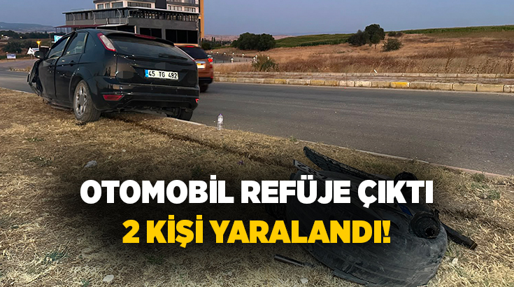  Uşak'ta sürücüsünün direksiyon hakimiyetini kaybettiği otomobilin refüje çıktığı kazada 2
