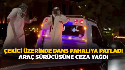 Aksaray’da yol ortasında dans eden 2 genç, kavşakta duran araç