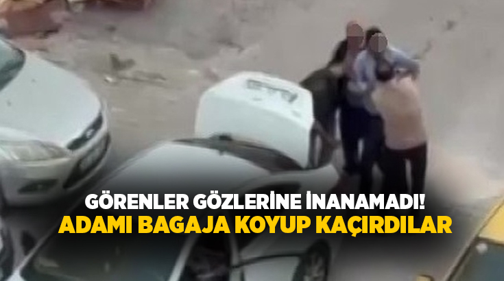 Adana'nın Seyhan ilçesinde bir grup kişinin, bir adamı zorla otomobilin
